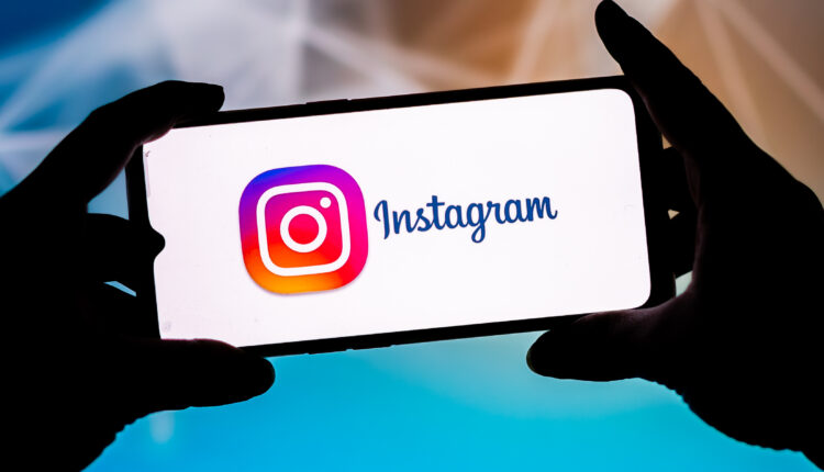 In this photo illustration an Instagram logo seen displayed